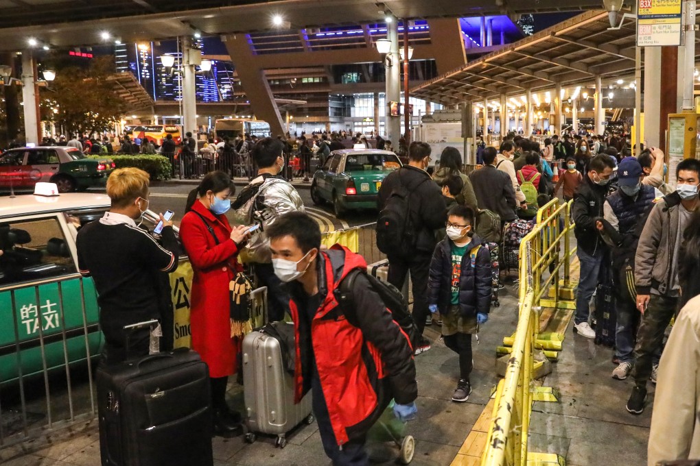 Travellers on the Hong Kong side of the Shenzhen Bay port queue for transport into the city. Photo: K.Y. Cheng