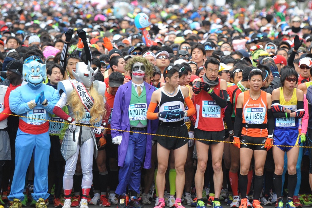 Runners wait for the 2014 Tokyo Marathon to start. Photo: Xinhua