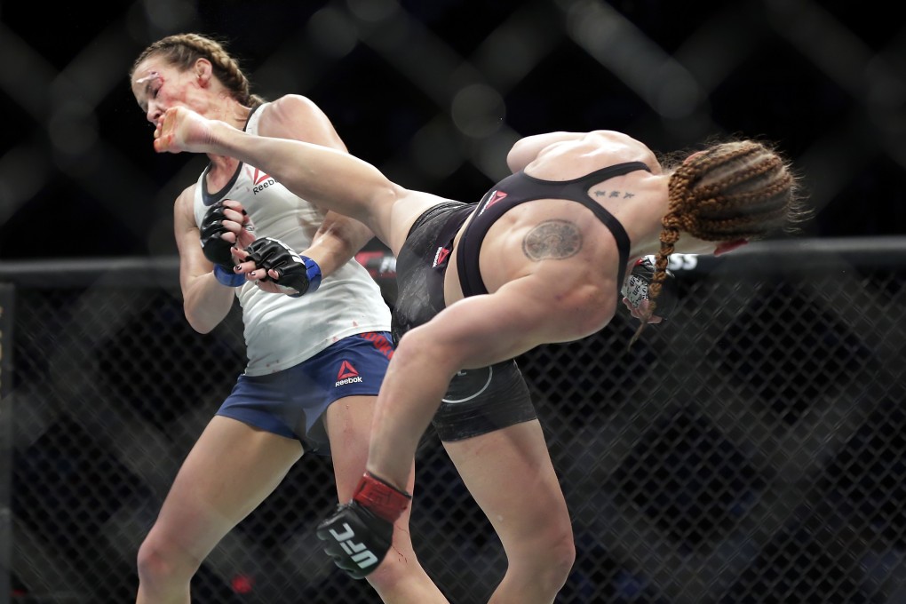Valentina Shevchencko lands a heel kick to Katlyn Chookagian’s face at UFC 247. Photo: AP