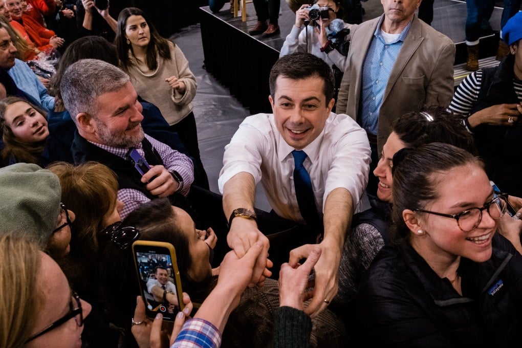 Pete Buttigieg, former mayor of South Bend and 2020 presidential candidate, centre, greets supporters in Lebanon, New Hampshire. Photo: Bloomberg