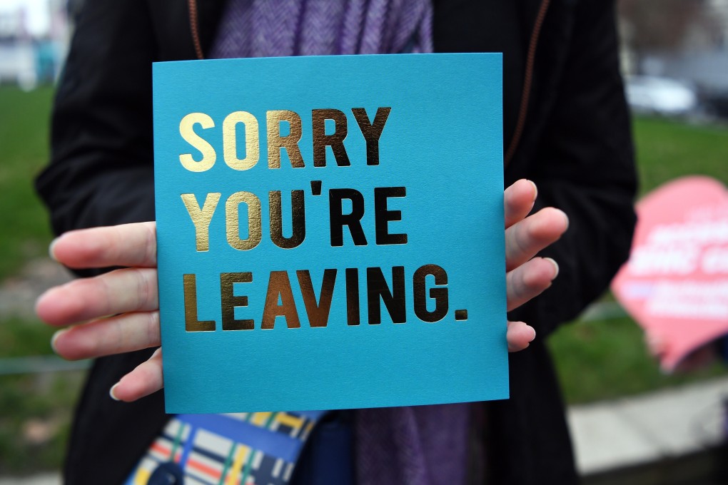 An EU supporter displays a card in London on January 31, when Britain officially left the union. Photo: EPA-EFE