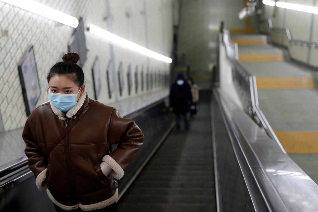 Beijingers have been ordered to wear face masks in public. Photo: Reuters