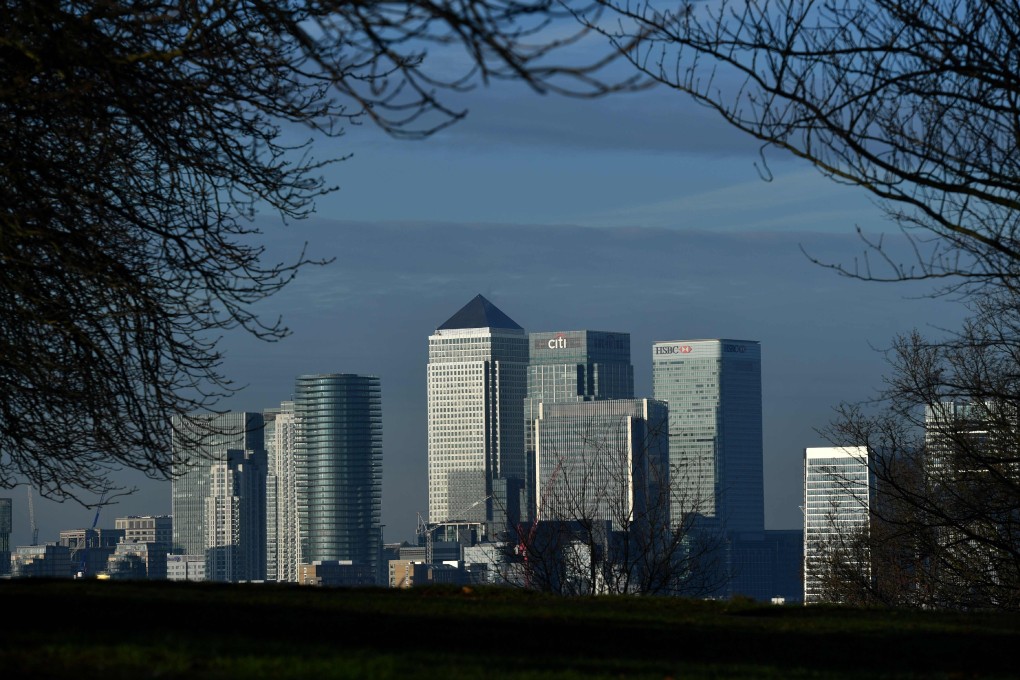 Office towers in Canary Wharf, London. On Monday, a Hong Kong-listed company acquired an office building in the financial district. Photo: AFP