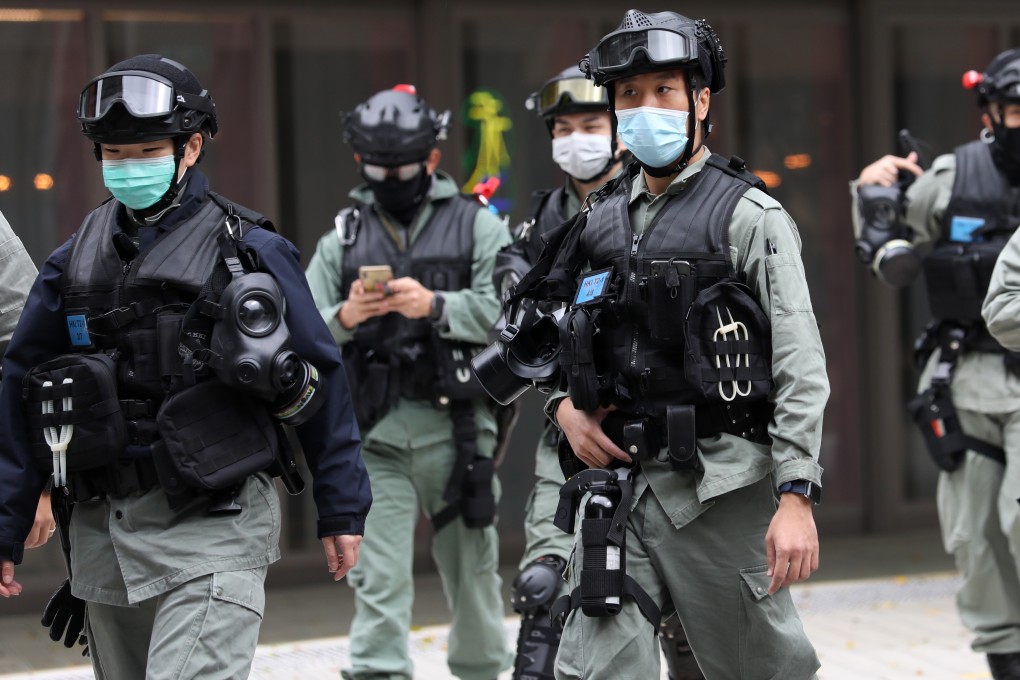 Police are searching for the two who have absconded from quarantine. Photo: Dickson Lee