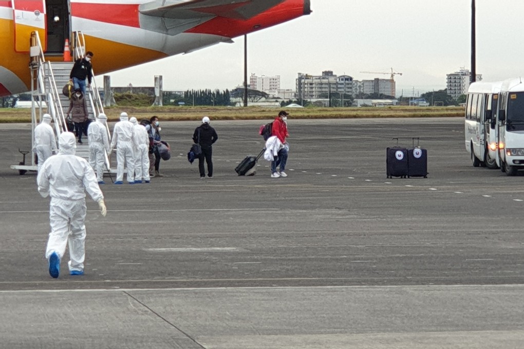 A chartered flight carrying Filipinos from Wuhan arrives in the Philippines on February 9. Photo: AP