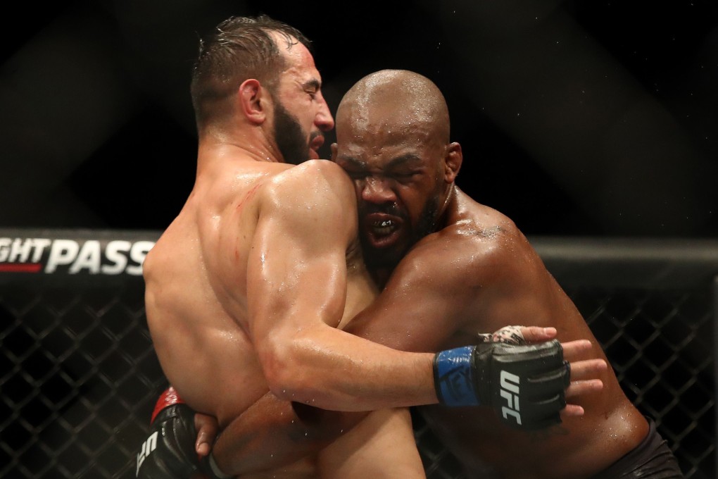 Jon Jones (right) and Dominick Reyes grapple at their UFC 247 light heavyweight bout last week. Photo: AFP