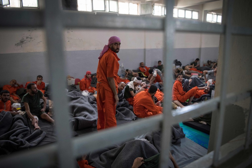 Men allegedly affiliated with the Islamic State (Isis) terror group in a Syrian prison in 2019. Photo: AFP