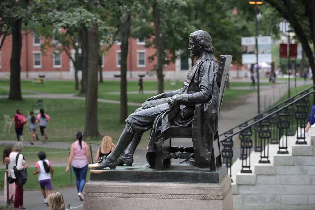 The statue of John Harvard sits in Harvard University campus in Cambridge, Massachusetts. Photo: AP