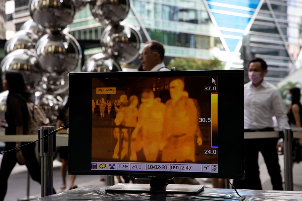 A thermal monitor outside an office building in the central business district of Singapore. Photo: Bloomberg