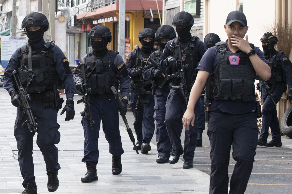 Police in tactical gear in Bangkok. Photo: AP