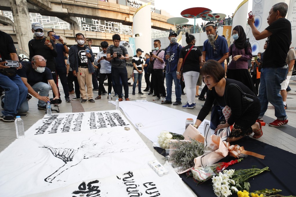 Flowers at a vigil to commemorate the victims of the shooting rampage at Terminal 21 shopping mall, in front of the Bangkok Art and Culture Centre in Bangkok, Thailand on Thursday. Photo: EPA-EFE