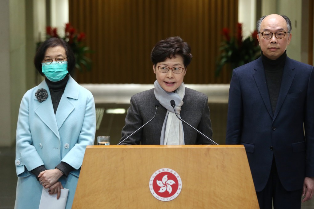 Chief Executive Carrie Lam, flanked by Secretary for Food and Health Sophia Chan Siu-chee and Secretary for Transport and Housing Frank Chan Fan, meets the media on February 11. Photo: Jonathan Wong