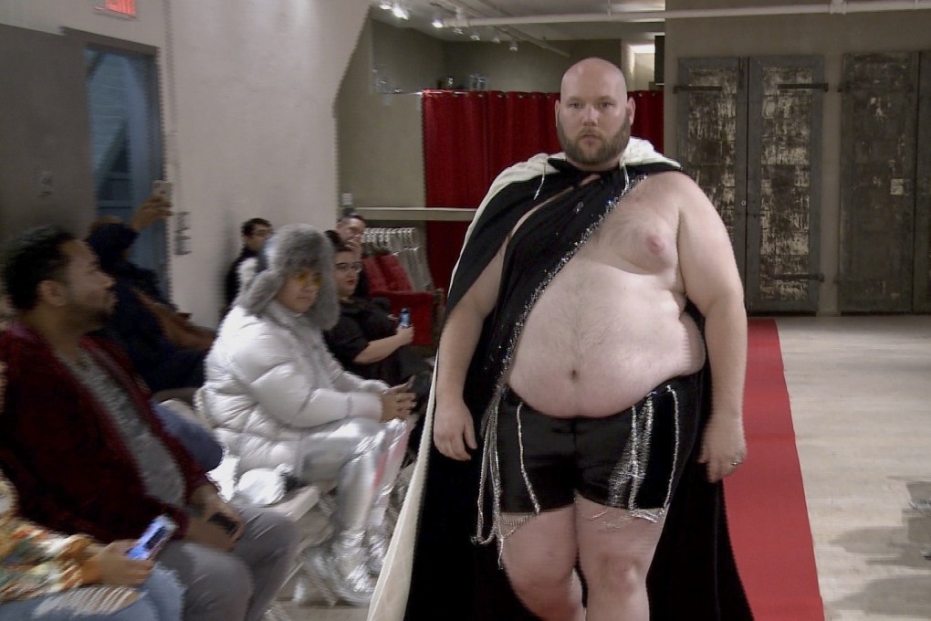 Joseph Diaz walks the runway at New York Fashion Week to shine a light on male body shaming issues and the importance of the male body positivity movement. Photo: Aron Ranen/AP