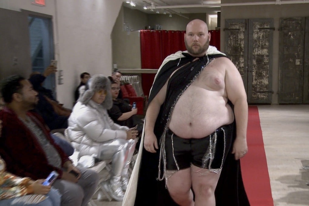 Joseph Diaz walks the runway at New York Fashion Week to shine a light on male body shaming issues and the importance of the male body positivity movement. Photo: Aron Ranen/AP