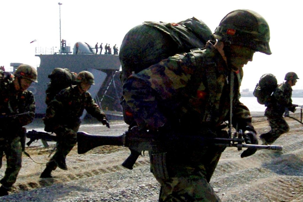 South Korean marines run from amphibious assault vehicles during a joint military exercise with US forces. Photo: AFP