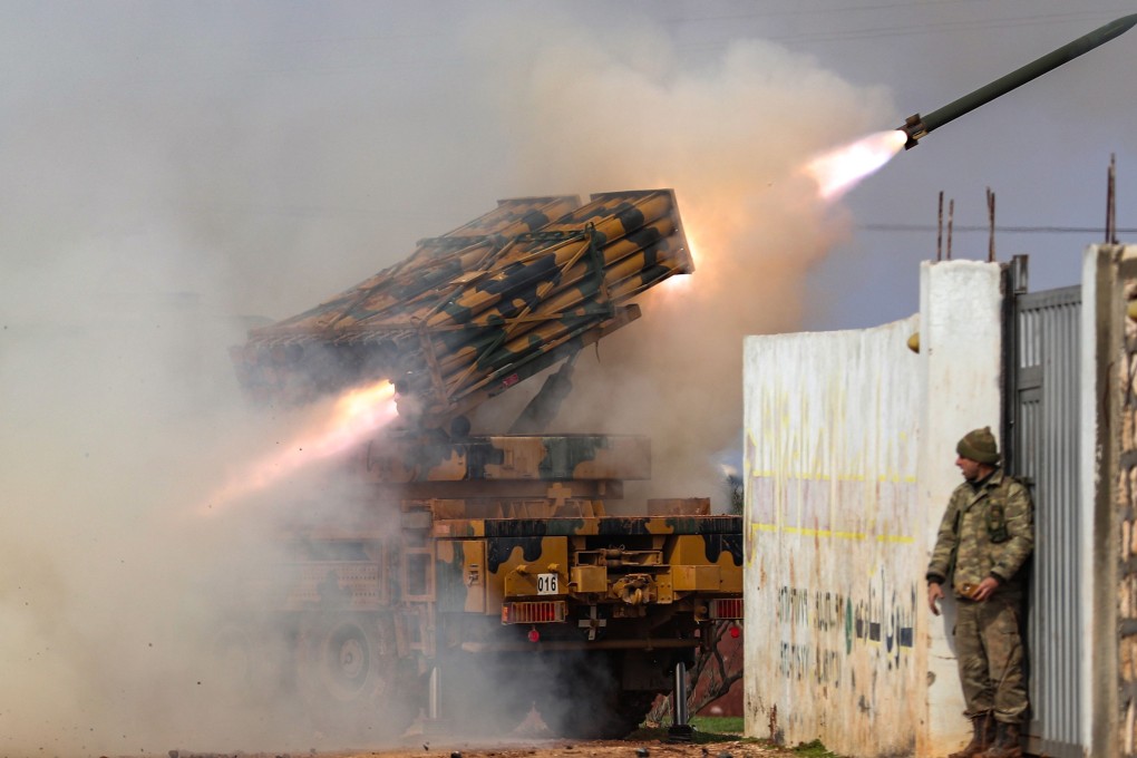 A Turkish military mobile rocket launcher fires from a position in the countryside of the Syrian province of Idlib towards Syrian government forces' positions in the countryside of neighbouring Aleppo province. Photo: AFP