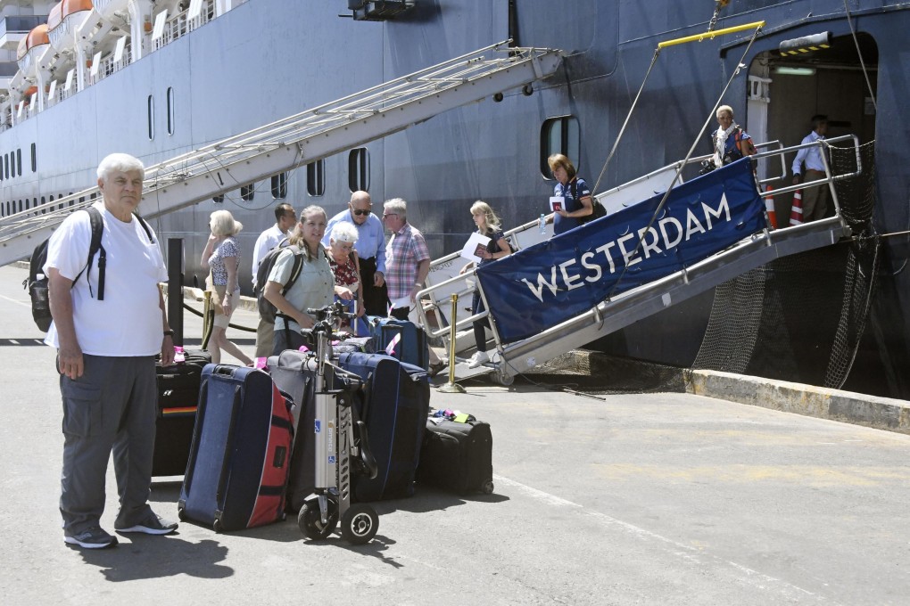 Westerdam cruise ship passengers disembark at the port of Sihanoukville on February 14, 2020. Photo: Kyodo