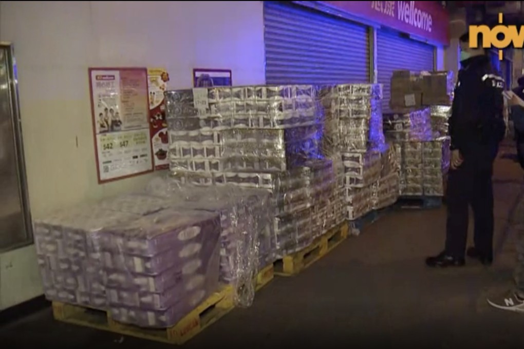 About 600 rolls of toilet paper were stolen from outside a supermarket in Mong Kok on Monday morning. Photo: Now TV