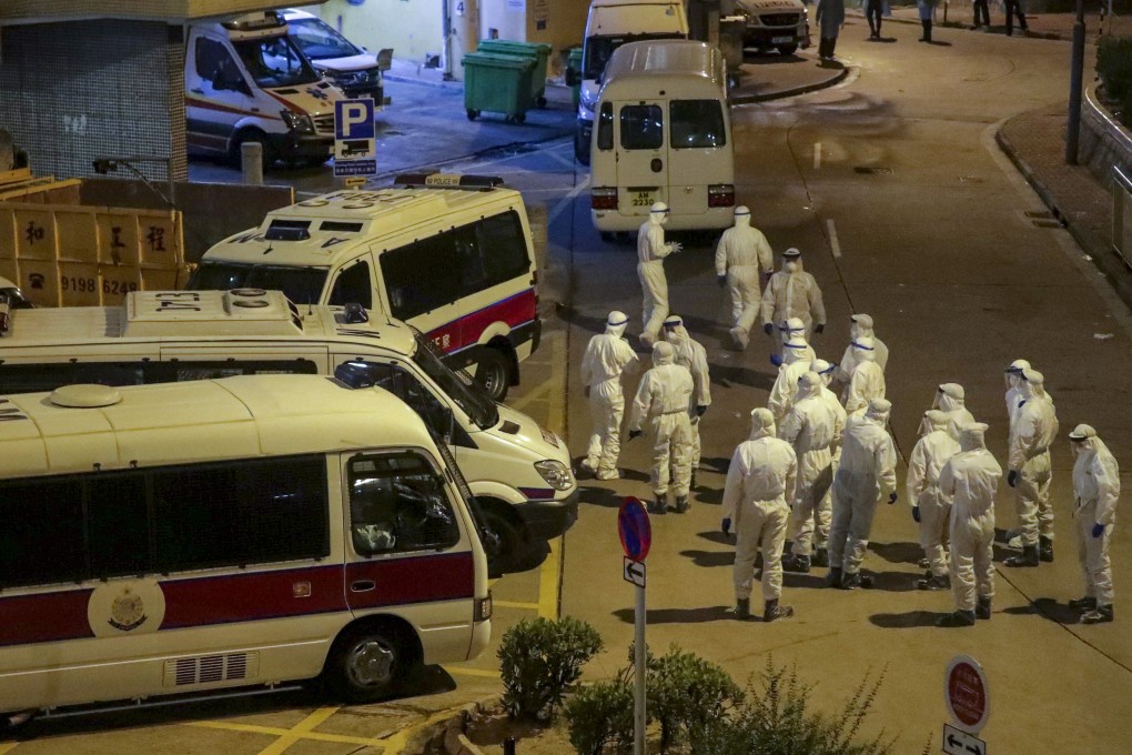 Police officers in full protective gear at an infection site in Hong Kong. Photo: Edmond So