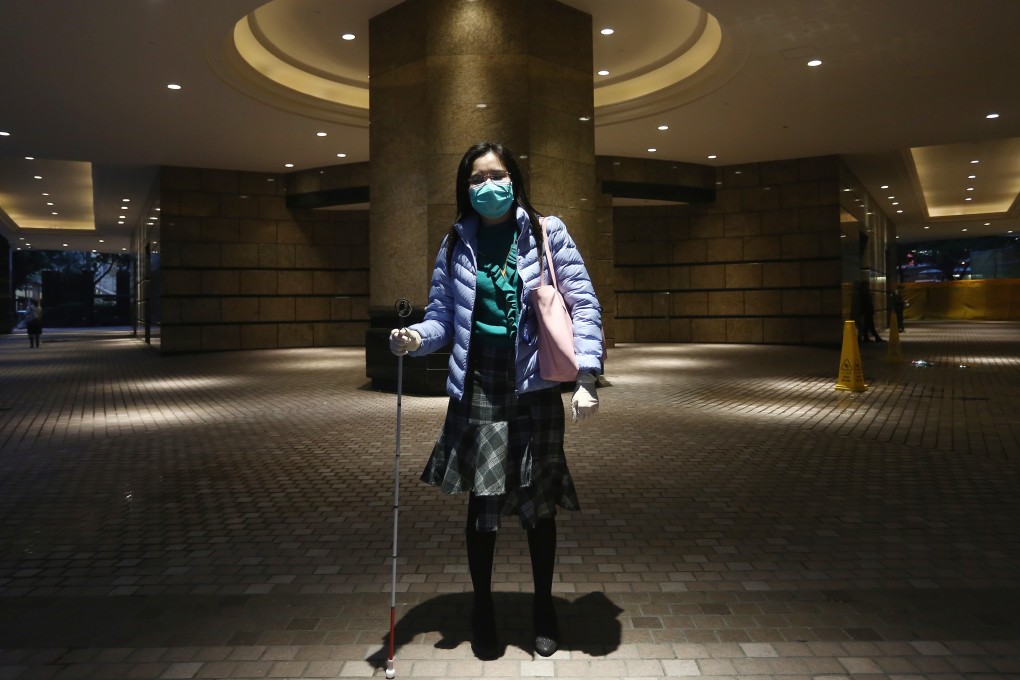 Jess Shek disinfects her cane after every use, but a shortage of hygiene products makes her feel vulnerable. Photo: Jonathan Wong