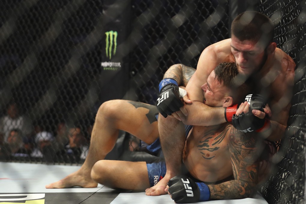 Khabib Nurmagomedov tries to choke out Dustin Poirier at UFC 242. Photo: AP