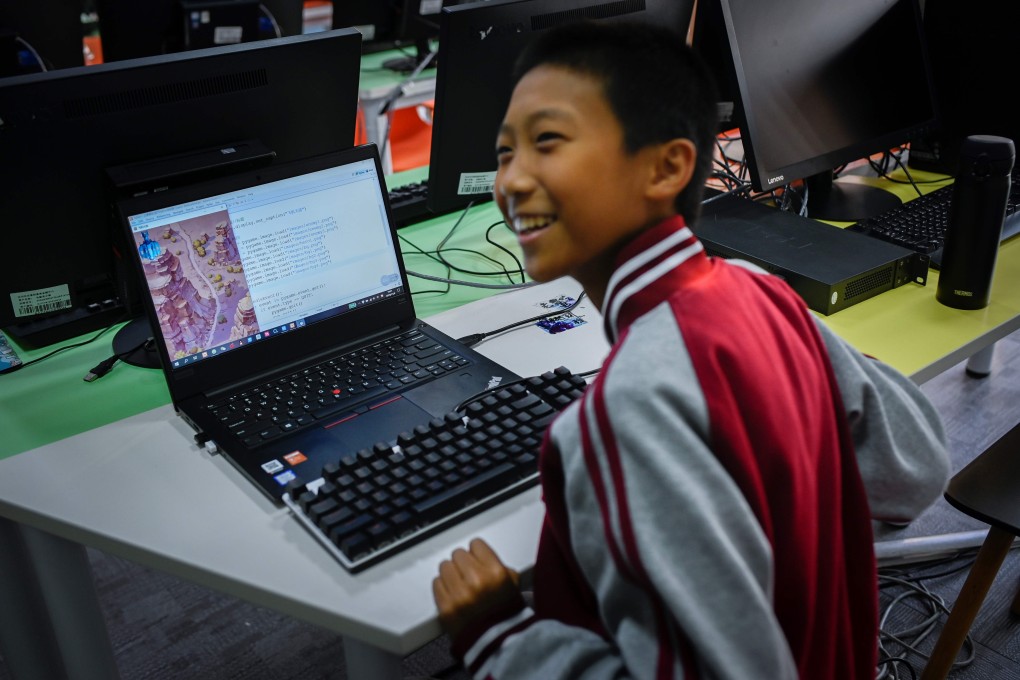 A boy participates in a computer coding course in Beijing in November 2019. Now Chinese students stuck at home due to the coronavirus can learn about AI online. Photo: AFP