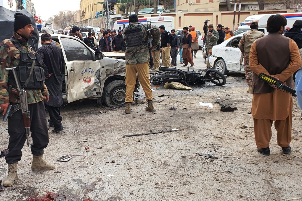 Pakistani security officials inspect the scene of a bomb blast in Quetta. Photo: EPA