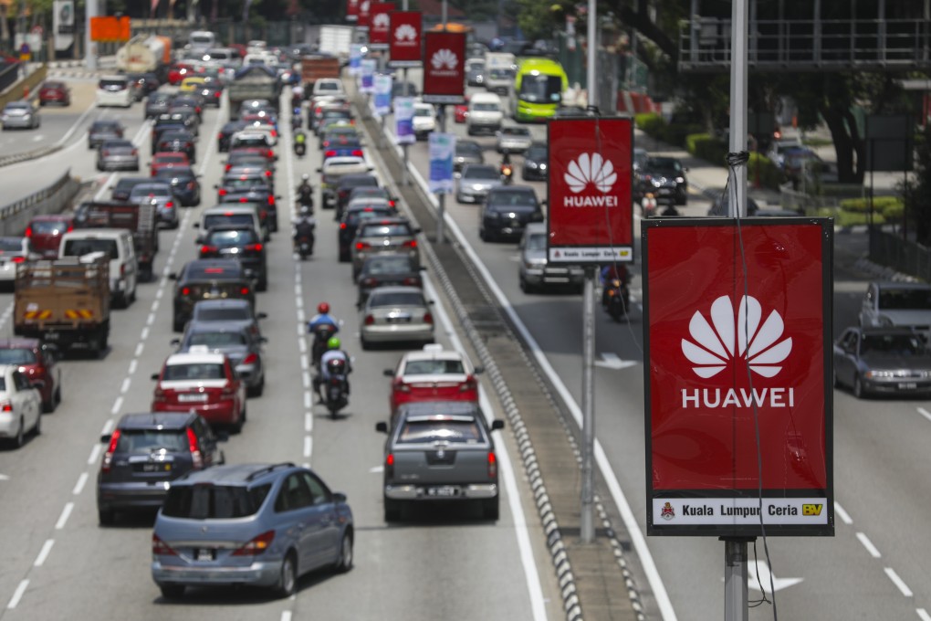 The logo of telecommunications equipment maker Huawei Technologies is displayed on the middle of a road in Kuala Lumpur, Malaysia, in June of last year. Photo: EPA-EFE