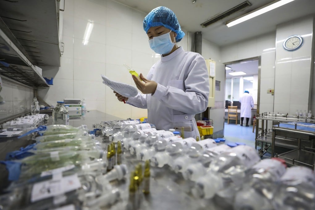 A nurse prepares medicine at Jinyintan Hospital, designated for new coronavirus infected patients, in Wuhan, China. Photo: AFP