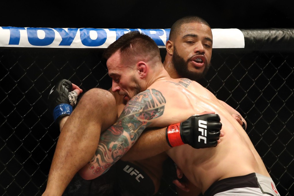James Krause grabs Trevin Giles’ leg at UFC 247. Photos: AFP