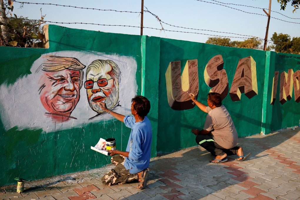 Paintings of US President Donald Trump and India’s Prime Minister Narendra Modi along a route Trump and Modi will be taking during Trump's visit next week. Photo: Reuters