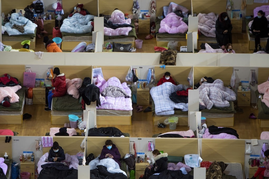 Coronavirus patients are housed at a temporary hospital converted from a sports centre in Wuhan. Photo: AP