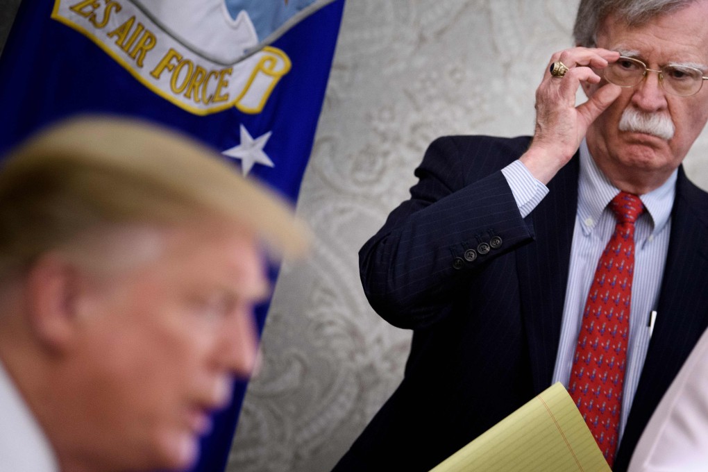 Then-US national security adviser John Bolton listens to US President Donald Trump speak to the press in May last year. Bolton, who left the White House last September, gave a lecture on Monday at Duke University in Durham, North Carolina, during which Ukraine was one of the topics discussed. Photo: AFP