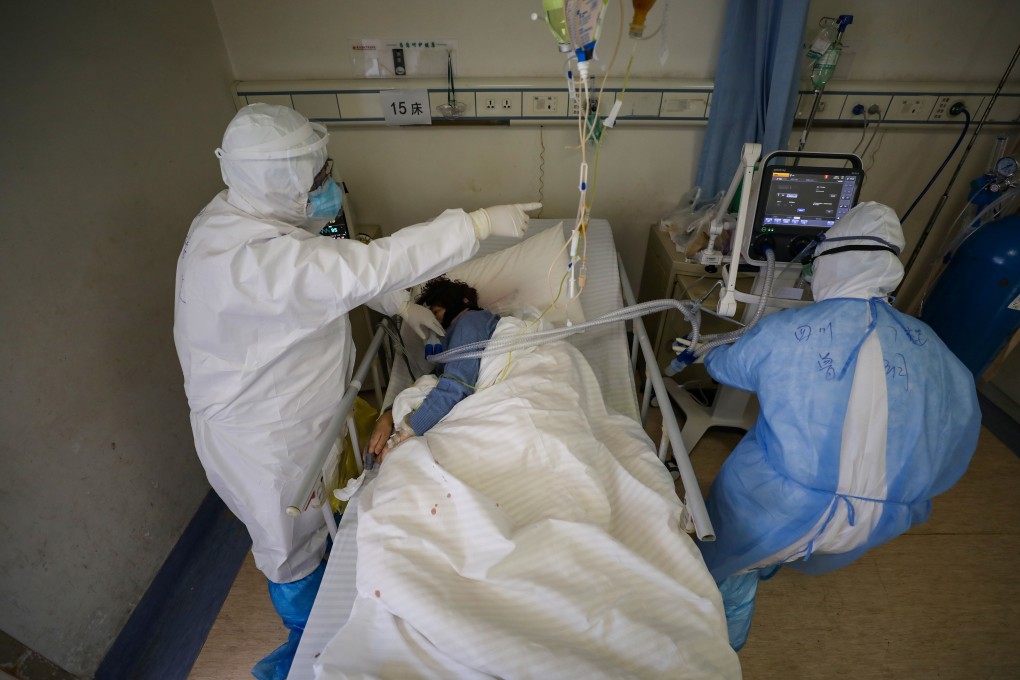 Medical workers attend to a patient in Red Cross Hospital in Wuhan, the epicentre of the novel coronavirus outbreak. Photo: Reuters