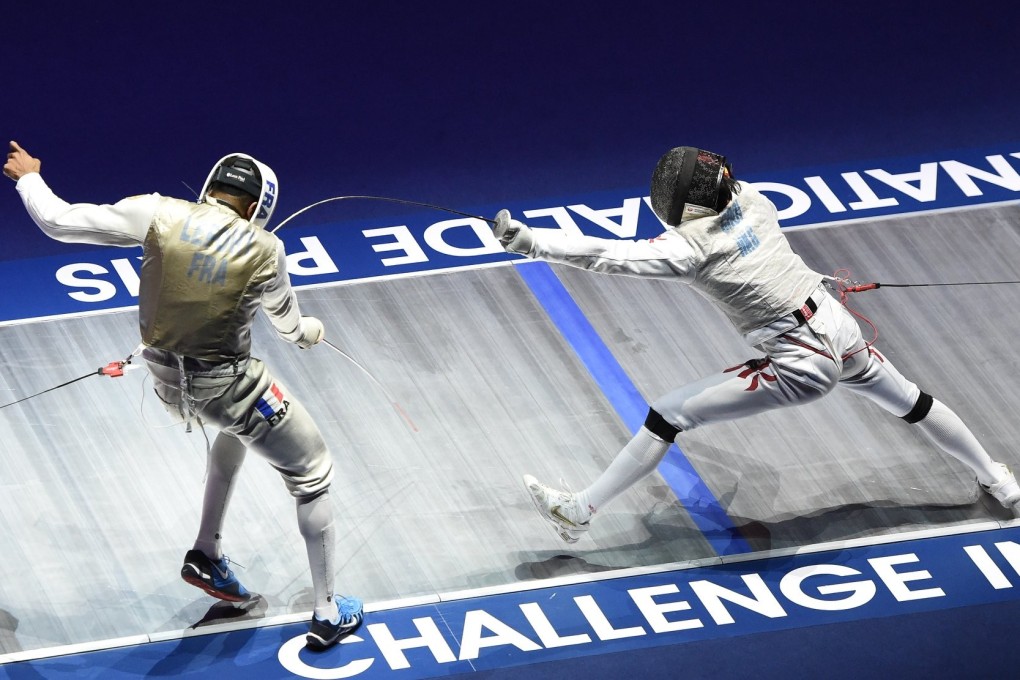 Ryan Choi (right) of Hong Kong against his French opponent in the team bronze medal match in the Paris World Cup. Photos: FIE