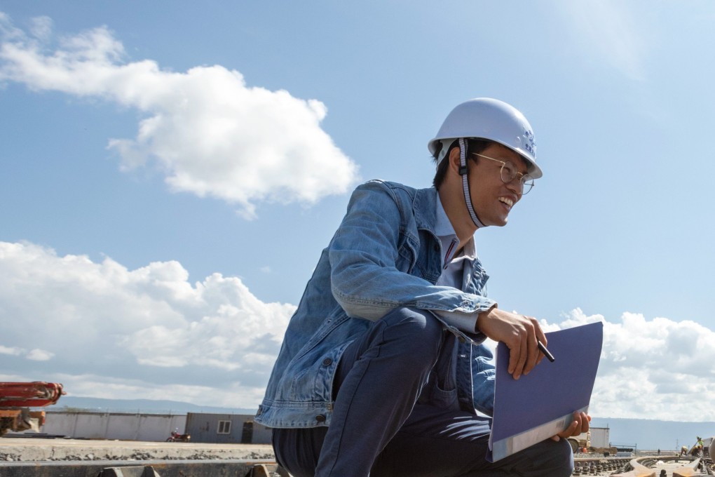 Workers check on the rails at an inland container depot in Naivasha, Kenya. Photo: Xinhua