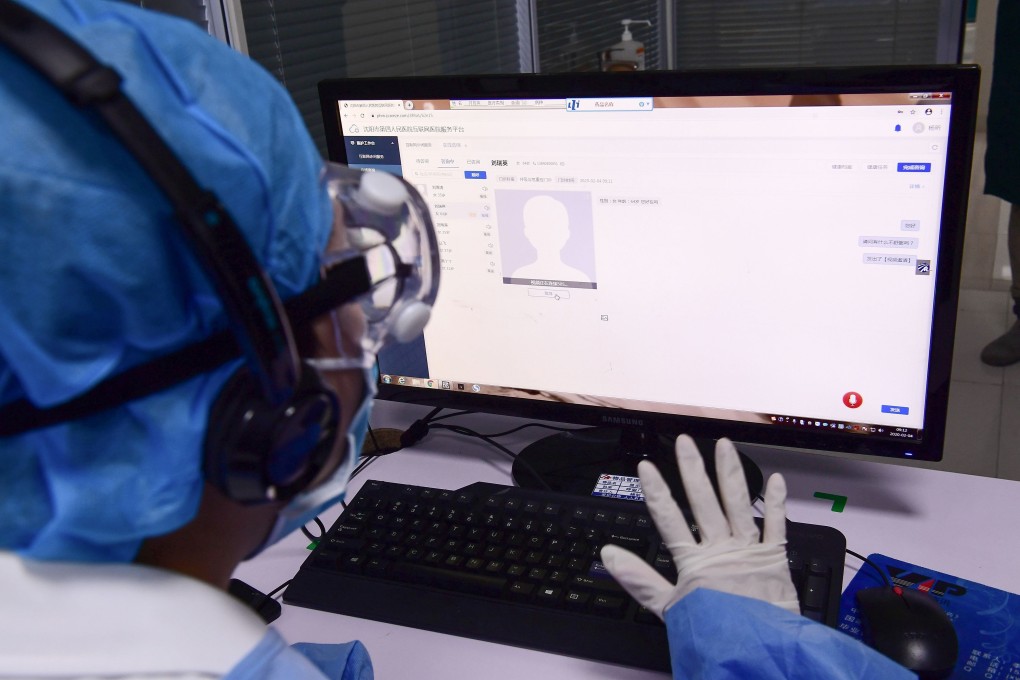 A doctor speaking with a patient during an online consultation session at a hospital in Shenyang in China’s northeastern Liaoning province amid the coronavirus outbreak. Photo: AFP via Getty Images