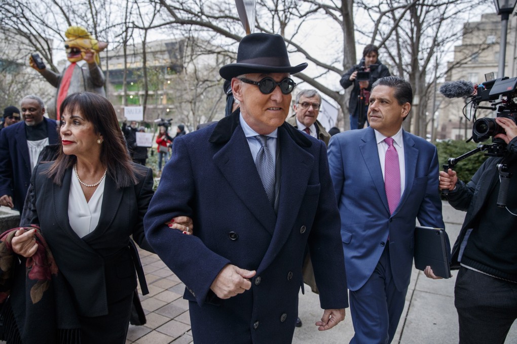 Roger Stone (centre) and his wife, Nydia (left), arrive for his sentencing hearing in Washington on Thursday. Photo: EPA-EFE