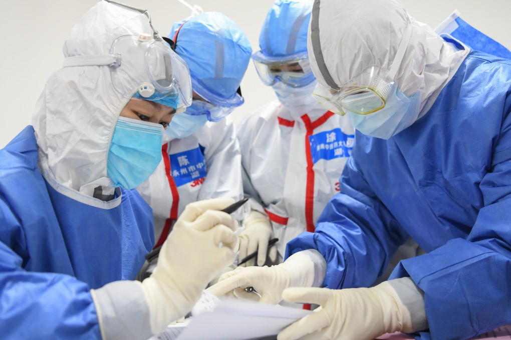 Only confirmed lab tests are now included in the figures. Photo: Xinhua