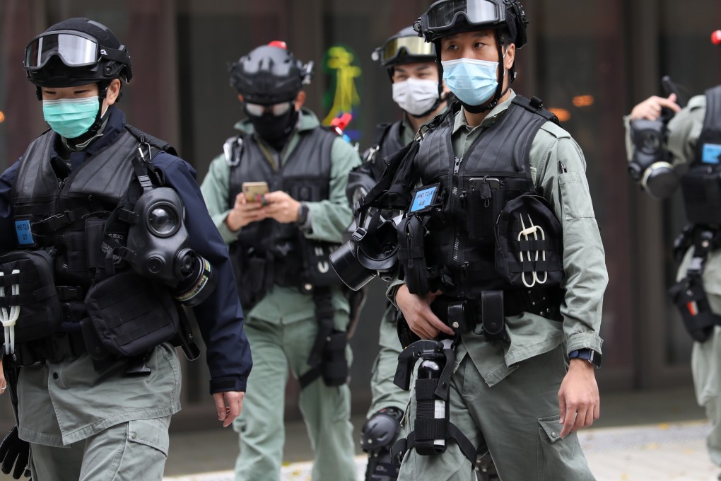 Riot police wearing masks in Sha Tin. Photo: Dickson Lee
