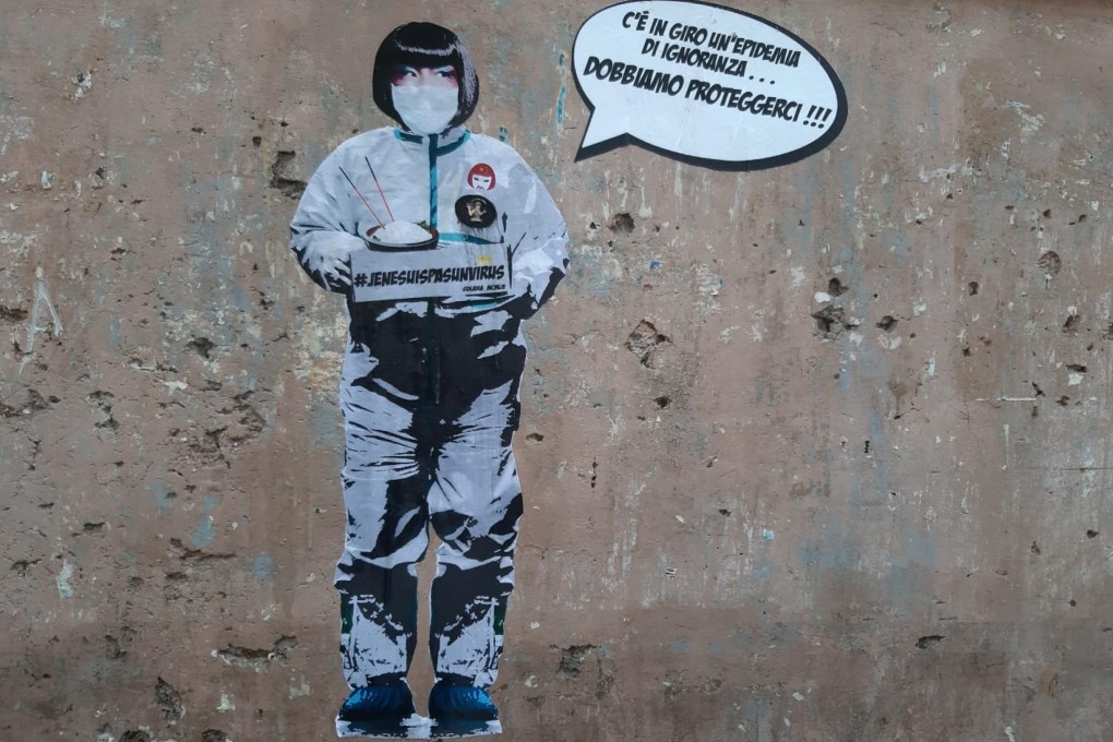A mural in the Chinese district of Rome shows an Asian woman wearing a protective suit saying, “There is an epidemic of ignorance around ... We must protect ourselves” and holding a placard that reads #JeNeSuisPaSunVirus (I am not a virus), a hashtag created by French Asians in reaction to anti-Asian racism amid the coronavirus public health emergency. Photo: EPA-EFE