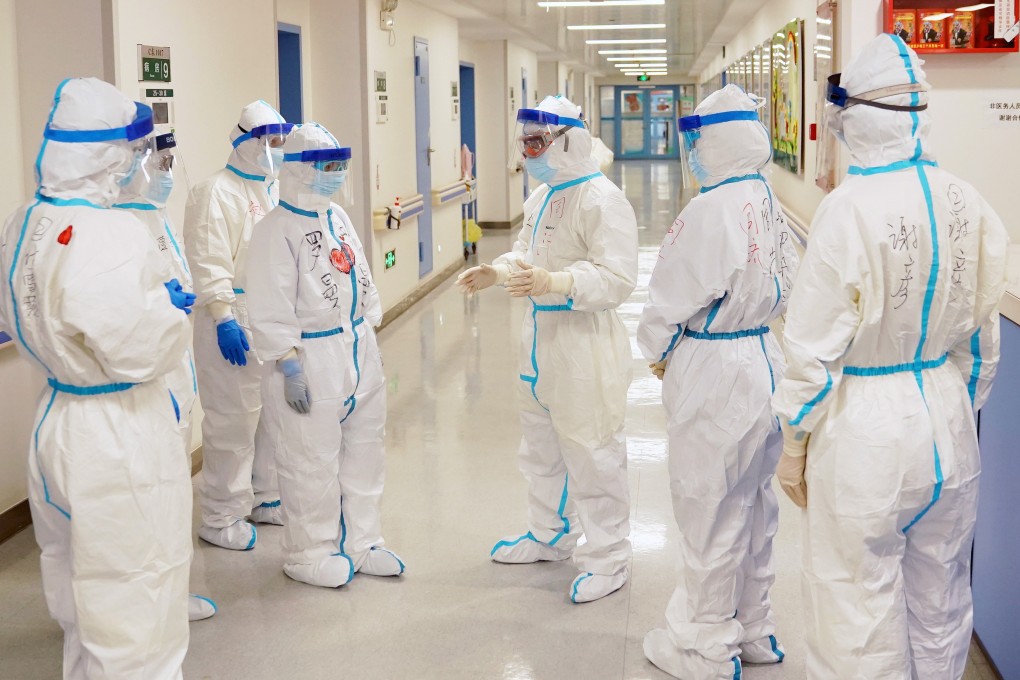 Supplies of protective gear like caps, gloves and boots are running low in Wuhan. Photo: Xinhua