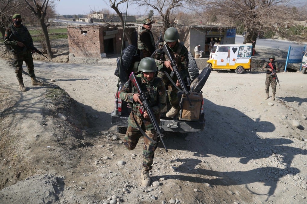 Afghan soldiers patrol at a check point in Nangarhar province. Photo: EPA