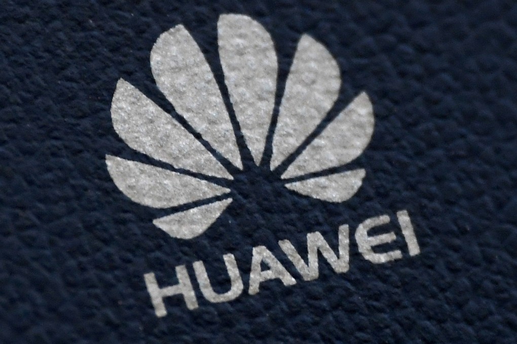 FILE PHOTO: The Huawei logo is seen on a communications device in London, Britain, January 28, 2020. REUTERS/Toby Melville/File Photo