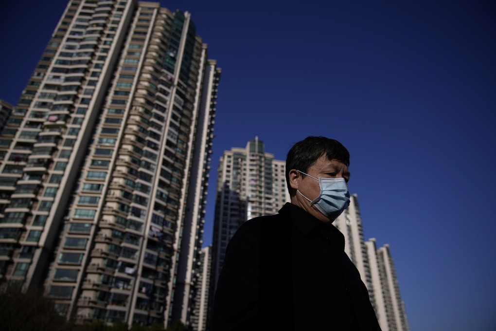 A man wears a protective mask in Shanghai on Thursday. Photo: Reuters