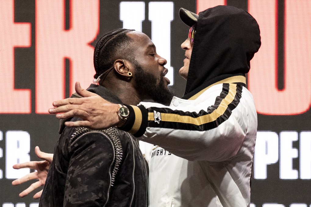 Deontay Wilder (left) and Tyson Fury face off on stage during a press conference before their rematch for the WBC heavyweight world championship at the Garden Arena in Las Vegas, Nevada. Photo: EPA
