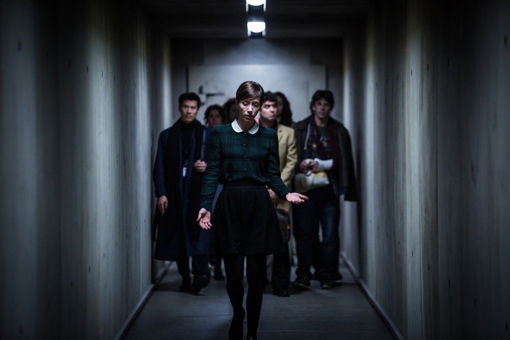 Sara Giraudeau (front) in a still from The Translators (category: IIA, French), directed by Régis Roinsard. Lambert Wilson, Olga Kurylenko, and Riccardo Scamarcio co-star.