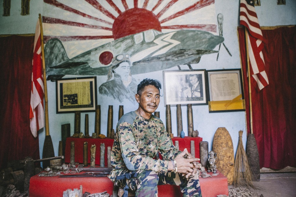 Muhlis Eso set up his independent museum of war relics on Morotai, Indonesia to show and preserve the items from World War II. Photo: Agoes Rudianto
