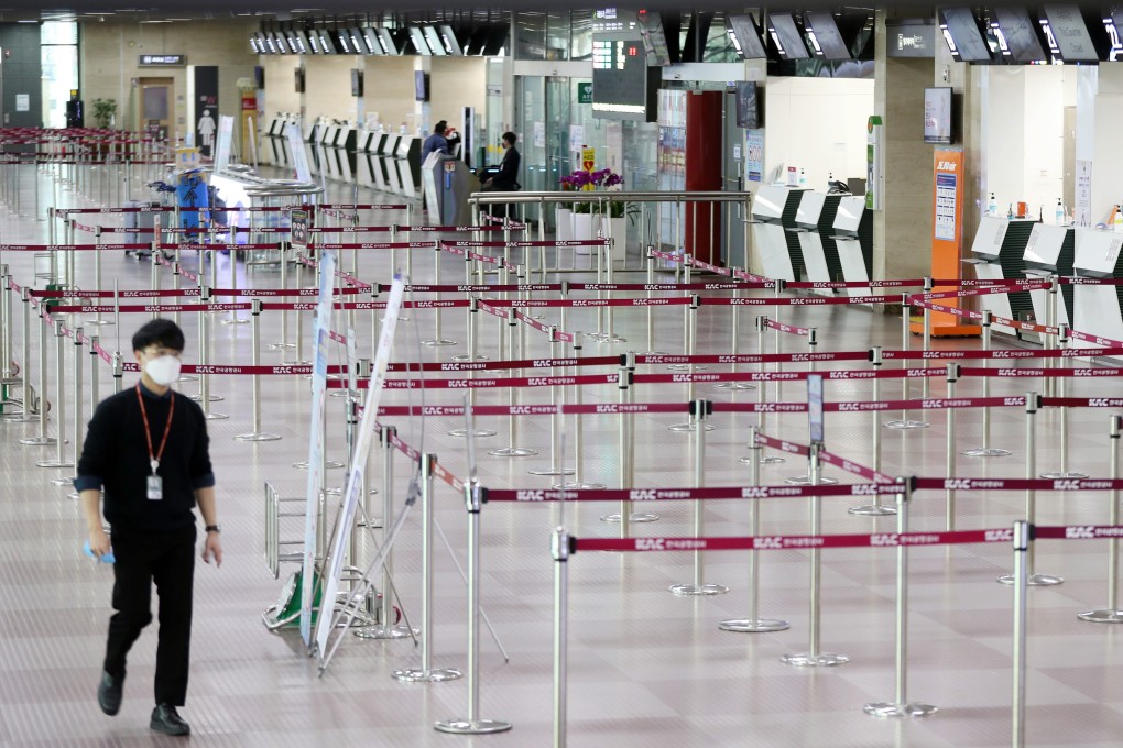 Ticket counters are deserted at the airport in Daegu, South Korea, on Monday. Photo: EPA-EFE