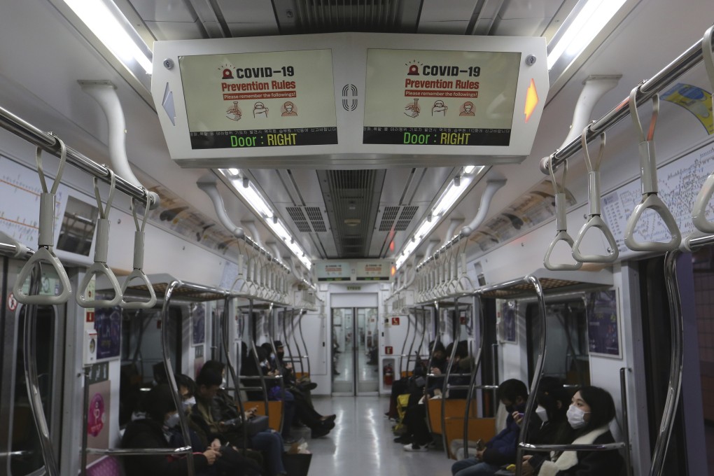 Electric screens warn about danger of coronavirus on a subway train in Seoul on February 23, 2020. South Korea's president said Sunday that he was putting his country on its highest alert for infectious diseases and ordered officials to take “unprecedented, powerful” steps to fight a soaring viral outbreak. Photo: Associated Press